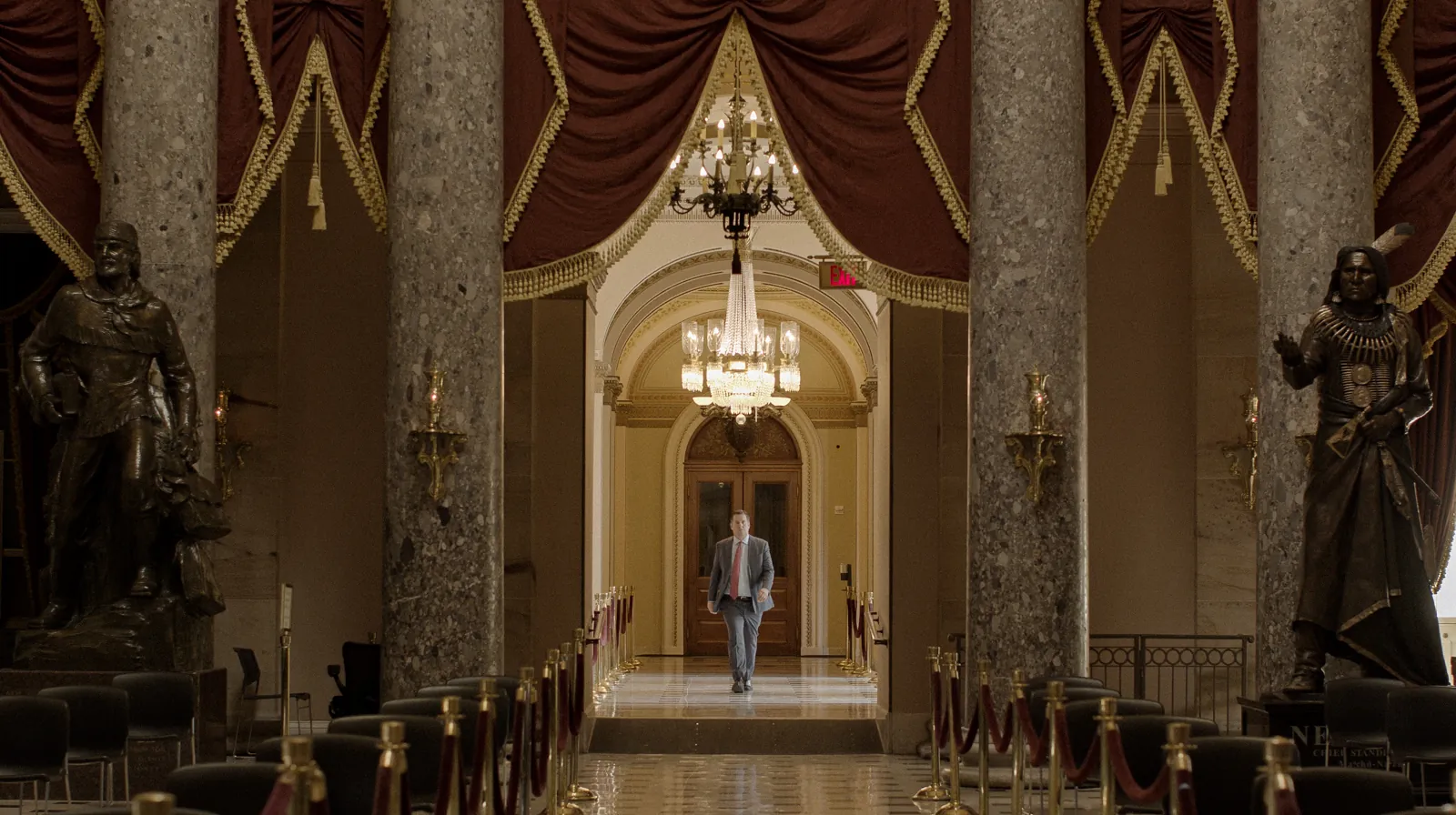 Devin Nunes walking through Statuary Hall in a scene from The Plot Against the President